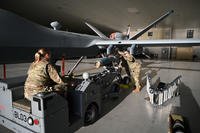 U.S. Air Force U.S. Air Force Tech. Sgt. Rachel Harmon and Master Sgt. Tom Anderson, weapons loaders assigned to the 174th Attack Wing, checks an inert GBU 12 laser guided missile on an MQ-9 Reaper at Springfield-Beckley Air National Guard Base in Springfield, Ohio, on March 18, 2025. (Senior Airman Colin Simpson/U.S. Air National Guard photo) U.S. Air Force U.S. Air Force Tech. Sgt. Rachel Harmon and Master Sgt. Tom Anderson, weapons loaders assigned to the 174th Attack Wing, checks an inert GBU 12 laser guided missile on an MQ-9 Reaper at Springfield-Beckley Air National Guard Base in Springfield, Ohio.